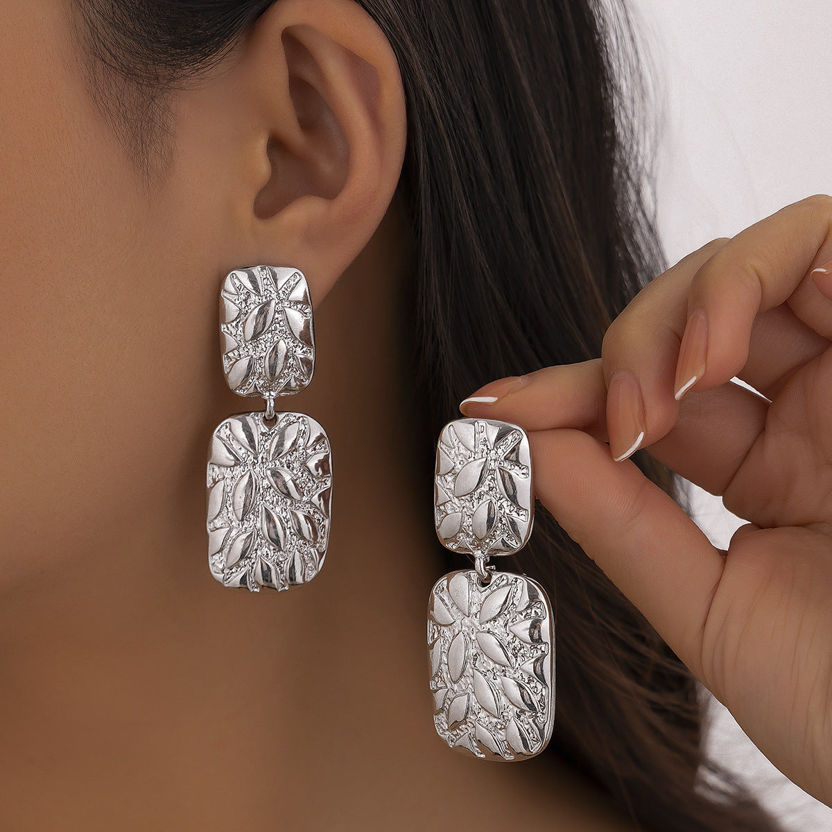 Minimalist and niche spiral patterned conch earrings