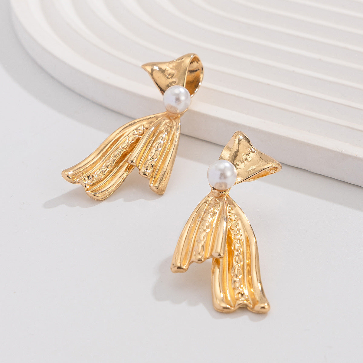 Fashionable tassel pearl earrings banquet minimalist bow alloy earrings